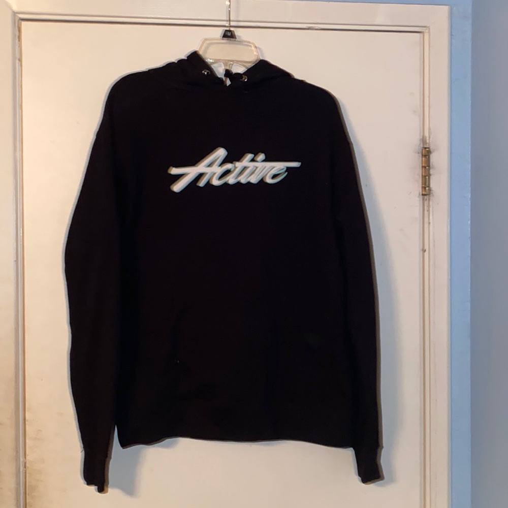 Active Mens Hoodie.Black and white with a little bit of green. Size Medium